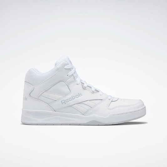 A high-top, all-white sneaker with the word "Reebok" printed on the side.