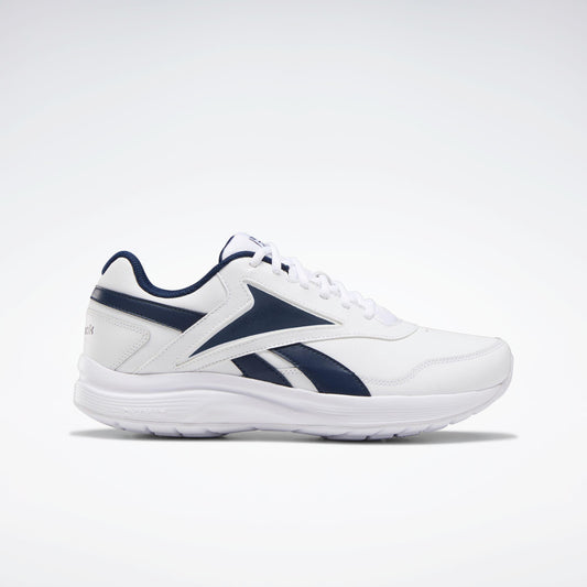 A white sneaker with navy blue accents, a low profile and a rounded toe.