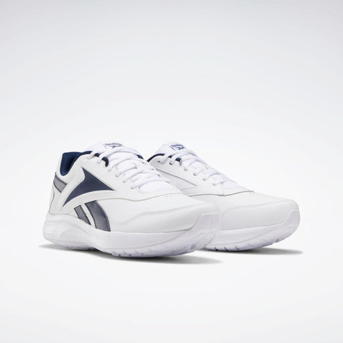 A pair of white athletic shoes with navy blue accents.
