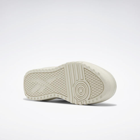 Beige sole with concentric circles and diamond pattern.