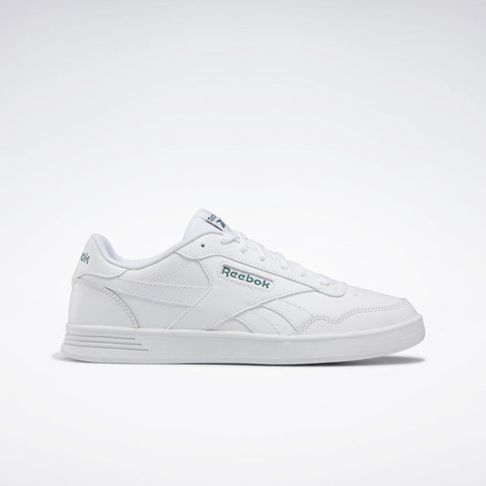 White sneaker with the word "Reebok" on the side.