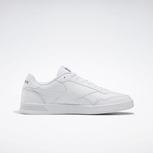 A white sneaker with a flat rubber sole and a stylized side logo.