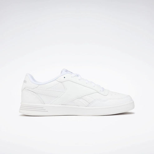 A white sneaker with a flat sole.