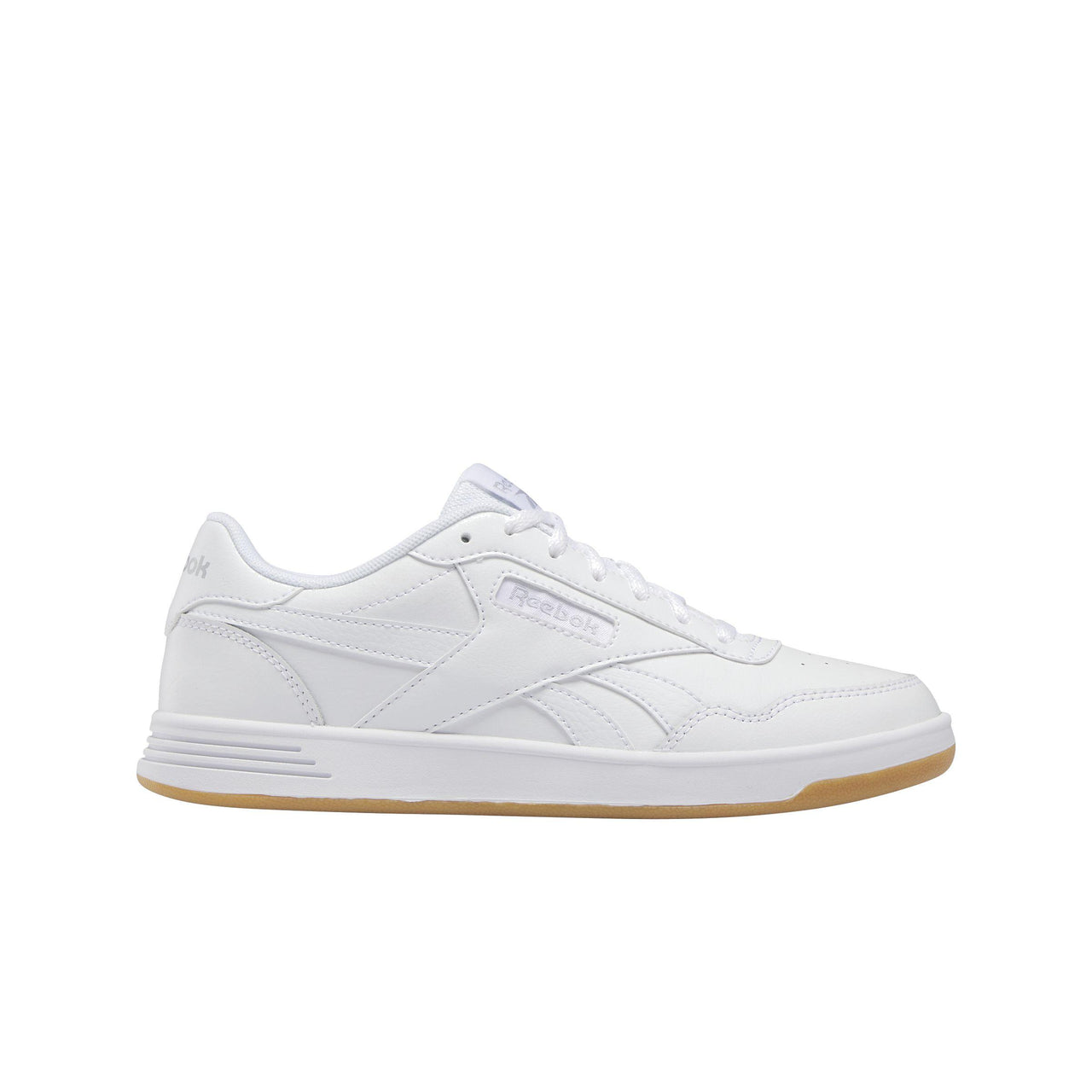 White sneaker with a gum sole.