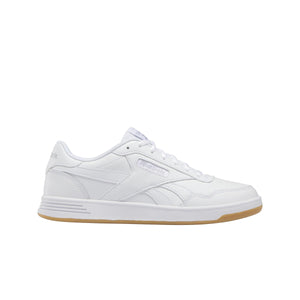 White sneaker with a gum sole.