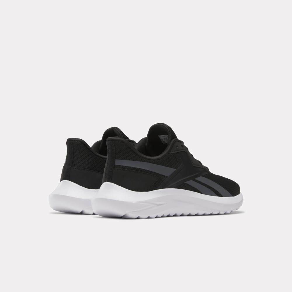 Pair of black athletic shoes with white soles.