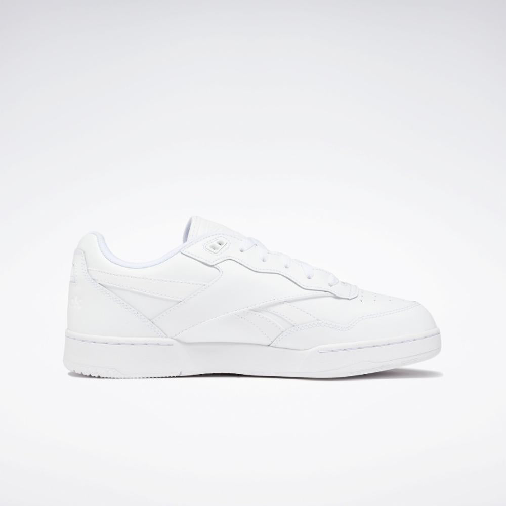 All-white sneaker with a flat sole.