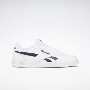 White sneaker with navy accents and "Reebok" in navy text.