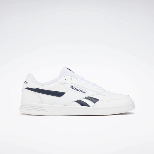 White sneaker with navy accents and "Reebok" in navy text.