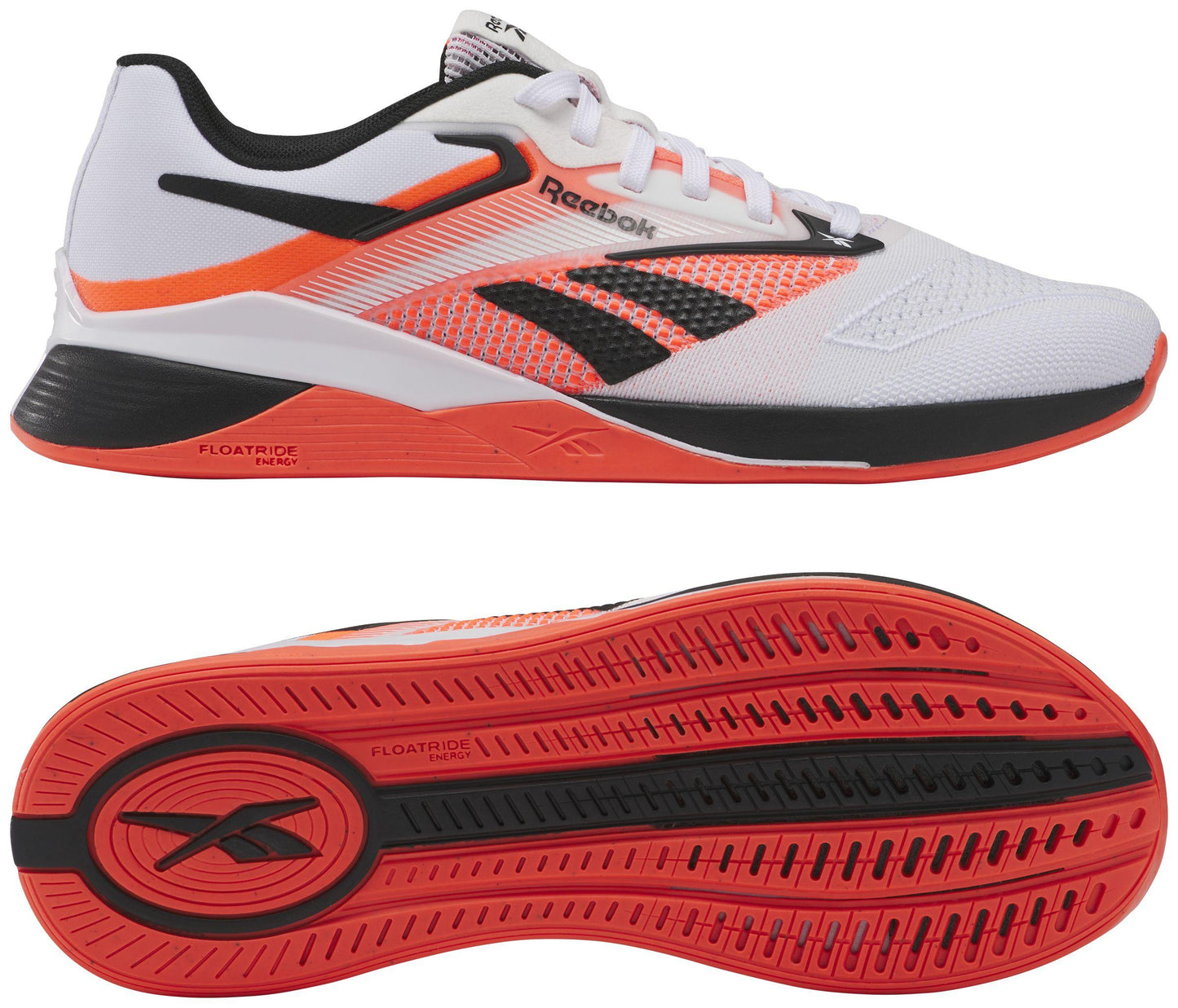 White and orange athletic shoe with black stripes, white laces, and a thick sole, displaying the sole with red grooves and black accents.