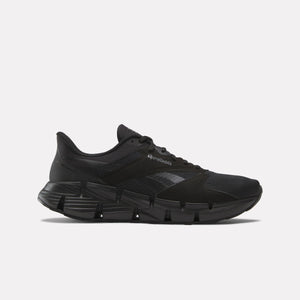 Black running shoe with a geometric sole.