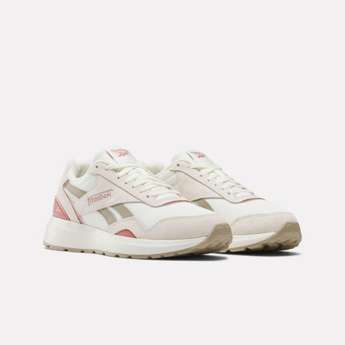 Off-white athletic shoes with pink and beige accents.