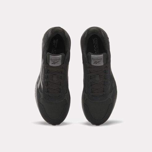 Top view of two black running shoes with Reebok logo on tongue.