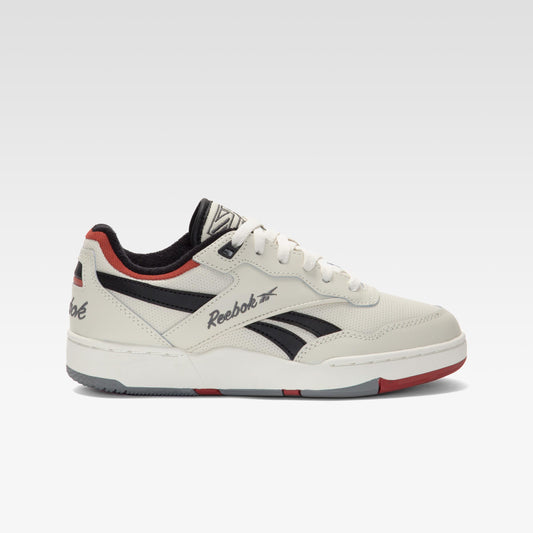 Low-top off-white sneaker with red, black and gray accents.