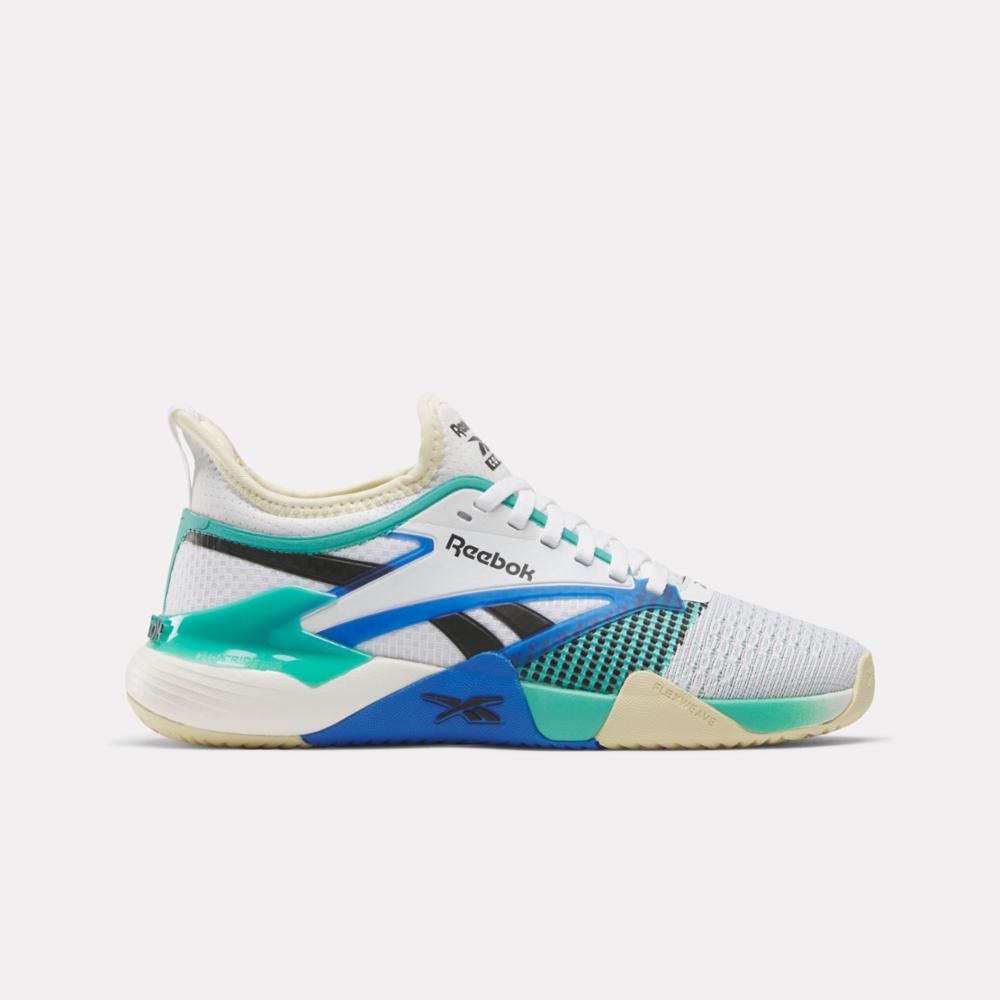 White and teal athletic shoe with the word "Reebok" written on the side.