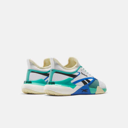 Pair of white, teal and blue athletic shoes, rear view.