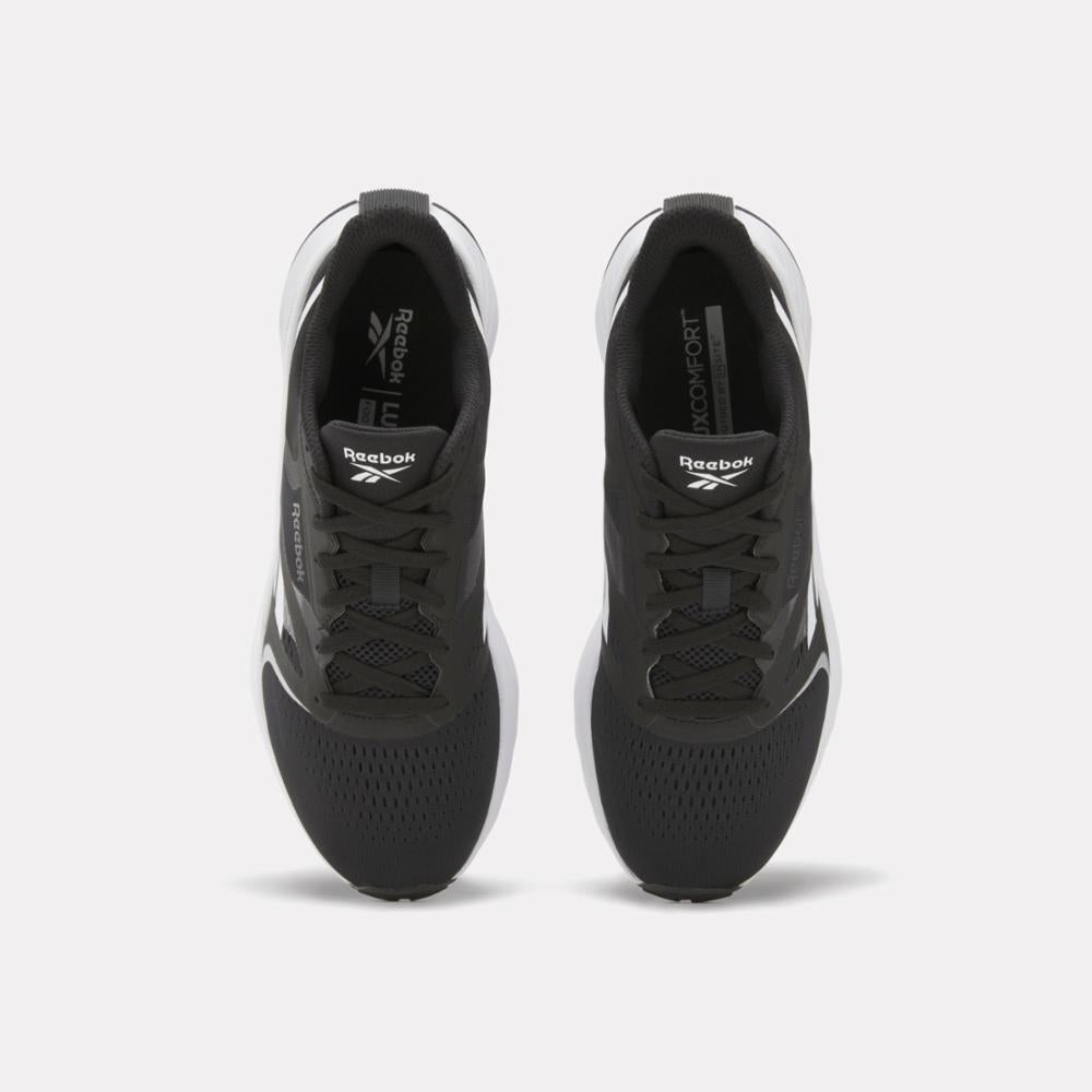 Pair of black running shoes with white accents, seen from above.