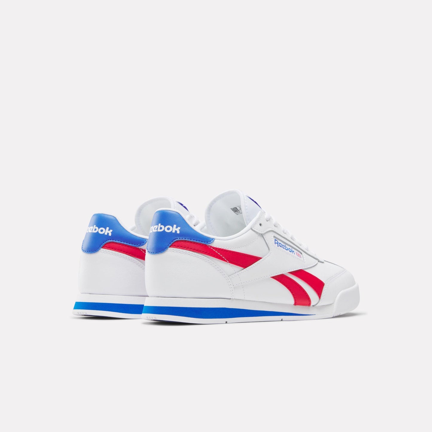 Low-top athletic shoe, white with red stripes and blue accents.