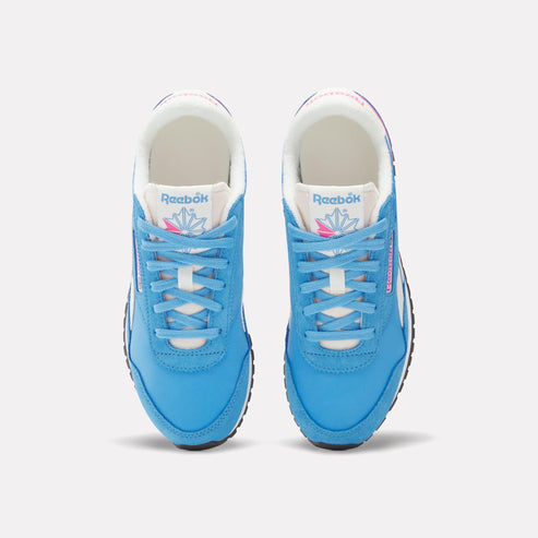 Pair of light blue sneakers, top-down view, white laces, white interior, and black soles.
