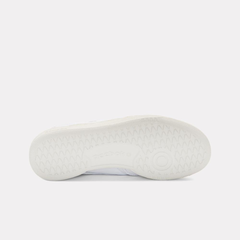 White shoe sole with intricate pattern.