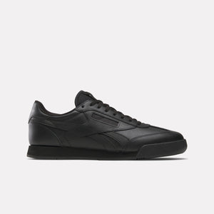 Black leather sneaker with a low profile, featuring a tonal sole and lace-up closure.