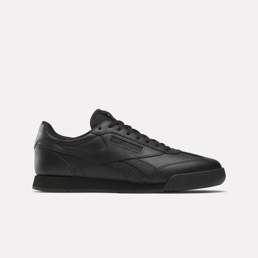 Black leather sneaker with a low profile, featuring a tonal sole and lace-up closure.