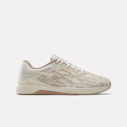 Low profile athletic shoe, off-white with pink marble-like pattern, lace-up.