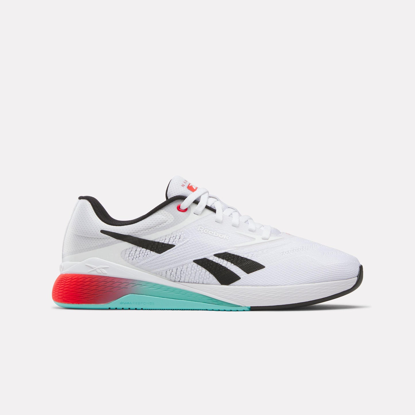 A white athletic shoe with black accents, featuring a gradient sole that transitions from red to turquoise.