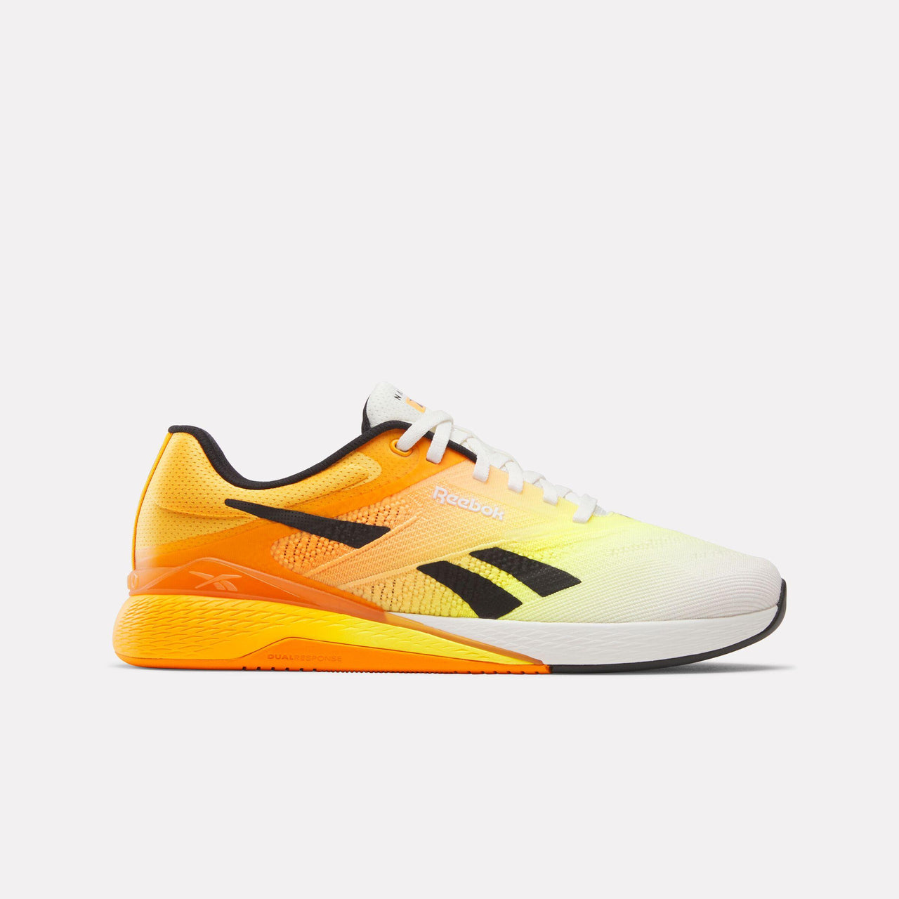 Low-top athletic shoe with a gradient from yellow to orange, black accents, and white laces.