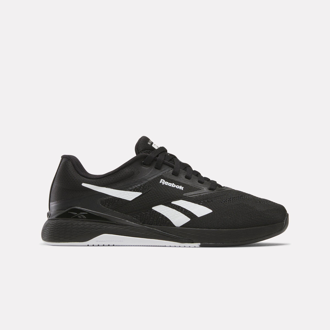 Black training shoe, side view, with white logo.