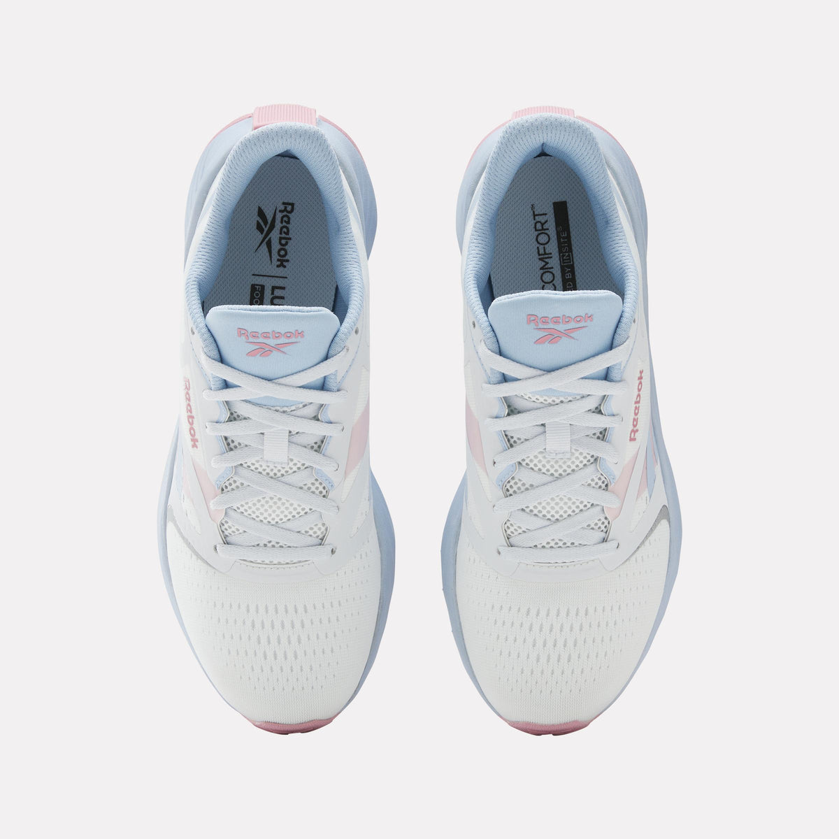 Overhead view of pair of white sneakers with light blue lining, white laces, and pink accents.