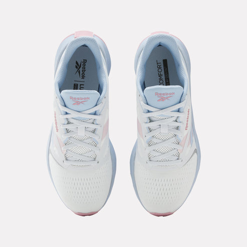Overhead view of pair of white sneakers with light blue lining, white laces, and pink accents.