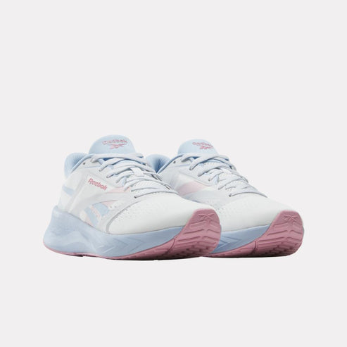 Pair of white running shoes with light blue accents and pink soles.
