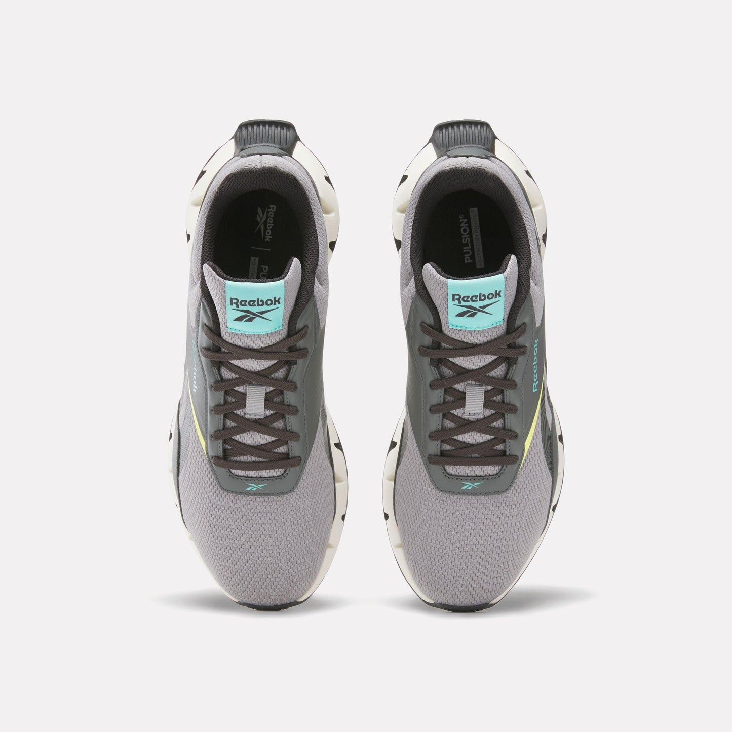 Pair of gray sneakers with dark laces and light blue logos.