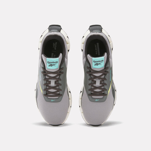 Pair of gray sneakers with dark laces and light blue logos.