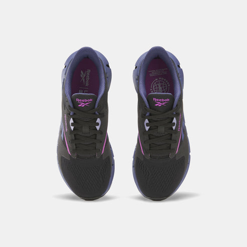 Overhead view of two identical black running shoes with purple accents, black laces and outsoles.