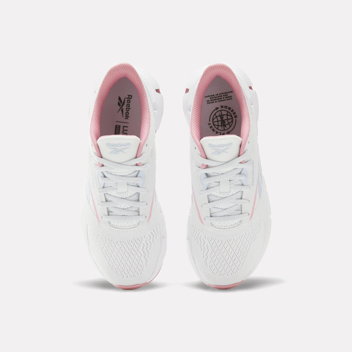 Pair of white athletic shoes with pink inner lining and laces.
