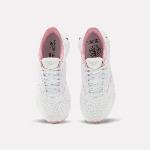 Pair of white athletic shoes with pink inner lining and laces.