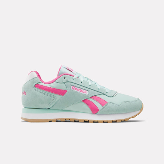 Mint green sneaker with pink accents and a gum sole.