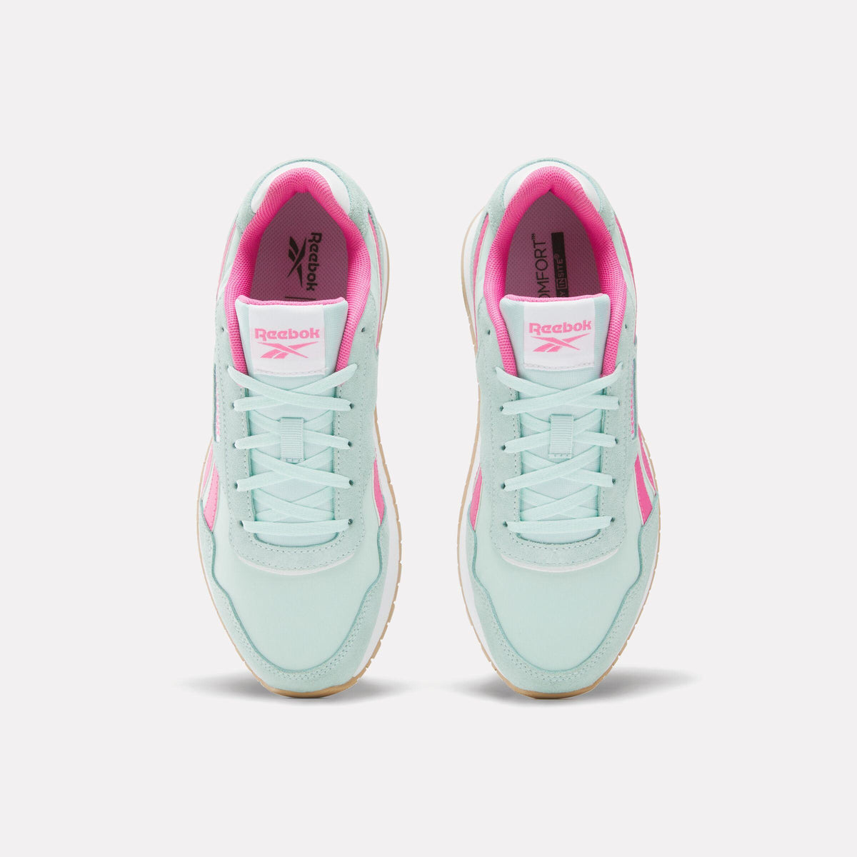 A pair of light blue sneakers with pink accents and white laces seen from above.