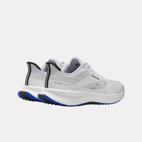 White running shoe with black and blue accents, side view.