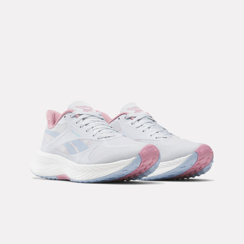 A pair of light grey running shoes with pink accents on the heel and tongue.