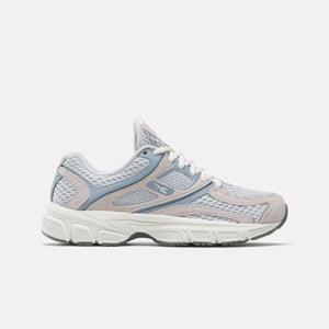 Side view of a white and light blue sneaker with mesh and synthetic overlays.