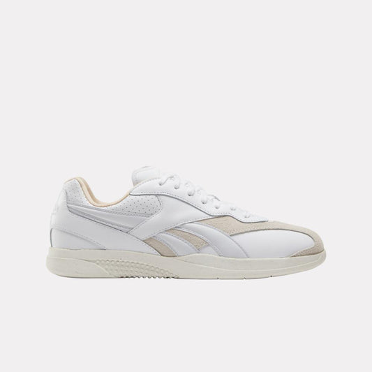 White low-top sneaker with beige accents, perforated details, and off-white sole.