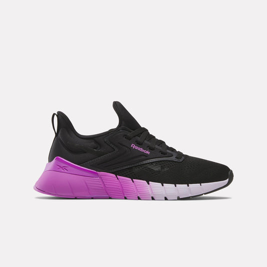 Black running shoe with purple accents and "Reebok" text.