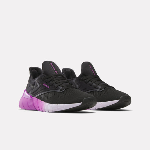 Pair of black athletic shoes with purple gradient accents.