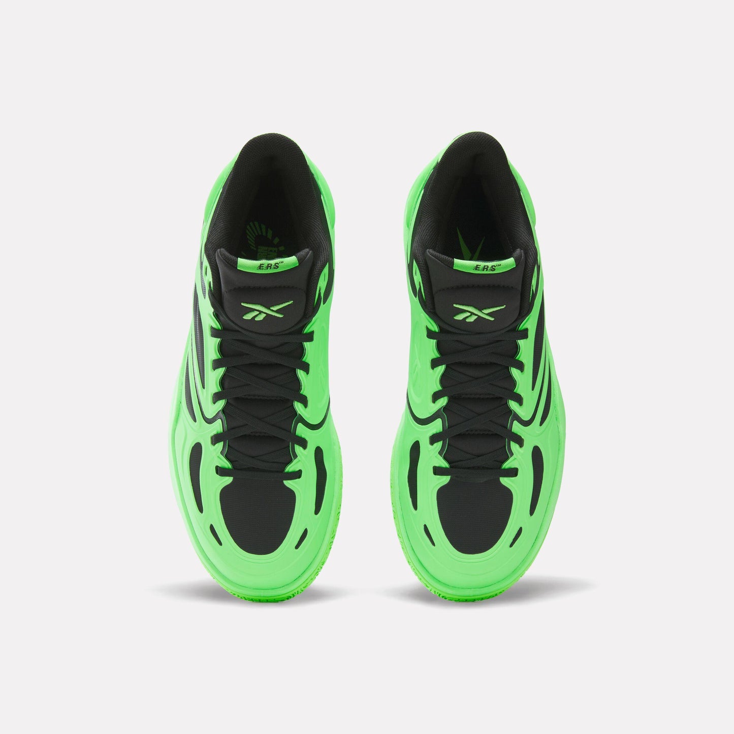 Overhead view of bright green sneakers with black laces and interior.