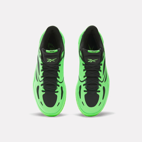 Overhead view of bright green sneakers with black laces and interior.