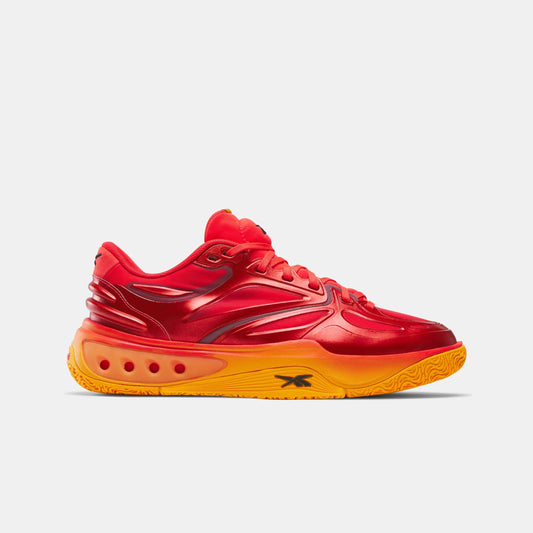 Red and orange low top sneaker with thick sole.