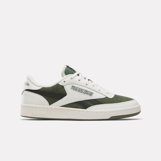 Low-profile sneaker with white laces, white and olive green leather upper and white sole.